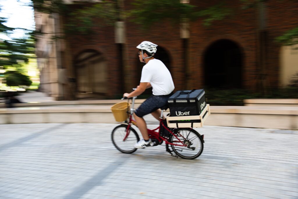 A man making a delivery with an ebike